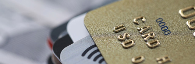 Extreme close-up of stacked credit cards.